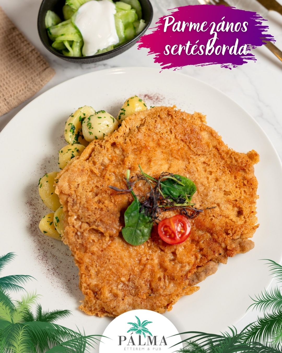 Parmezános sertésborda, petrezselymes burgonyával, tejfölös uborkasalátával